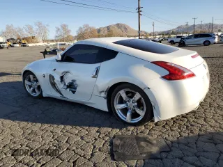 2011 Nissan 370Z Touring with VIN JN1AZ4EH3BM553076, listed as a Copart auction lot 41897865 with 126,685 mi miles and Salvage Title. Bid and sale history available at carsss.com. Image 2.