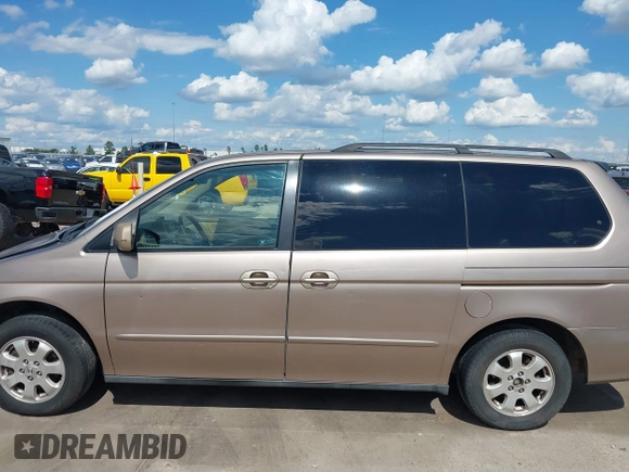 2003 Honda Odyssey EX-L z VIN 5FNRL18993B116892, wystawiony jako IAAI lot #42241908 z przebiegiem 276 223 mil mil oraz . Historia ofert i sprzedaży dostępna na DreamBid. Obrazek 15.