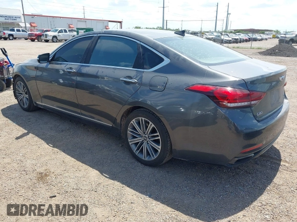2018 Genesis G80 3.8L z VIN KMHGN4JE6JU247918, wystawiony jako IAAI lot #42423370 z przebiegiem 154 840 mil mil oraz . Historia ofert i sprzedaży dostępna na DreamBid. Obrazek 3.