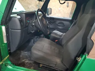 2005 Jeep Wrangler X с VIN 1J4FA39S35P305742, выставлен на аукционе Copart как лот 57124995 с пробегом 159 419 миль миль и Списание • Salvage title. История ставок и продаж доступна на DreamBid. Изображение 7.