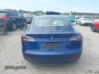 2020 Tesla Model 3 Standard Range Plus with VIN 5YJ3E1EA7LF785838, listed as a IAAI auction lot 41586081 with 38,392 mi miles and . Bid and sale history available at carsss.com. Image 16.