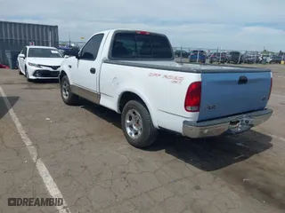1999 Ford F-150 Work Series with VIN 2FTZF1729XCA83871, listed as a IAAI auction lot 42009506 with 234,988 mi miles. Bid and sale history available at carsss.com. Image 3.