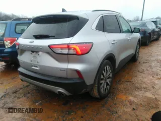 2020 Ford Escape Titanium Hybrid with VIN 1FMCU0DZ8LUB13911, listed as a IAAI auction lot 41249498 with 64,108 mi miles and . Bid and sale history available at DreamBid. Image 4.