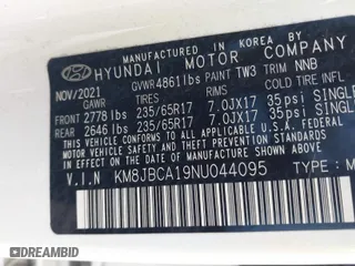 2022 Hyundai Tucson Hybrid Blue with VIN KM8JBCA19NU044095, listed as a IAAI auction lot 41482459 with 58,723 mi miles. Bid and sale history available at carsss.com. Image 9.