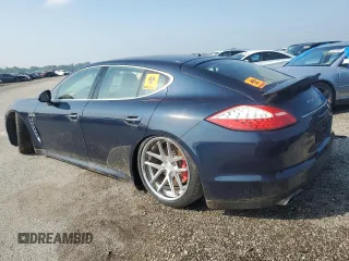 2010 Porsche Panamera Turbo z VIN WP0AC2A77AL091335, wystawiony jako Copart lot #57105045 z przebiegiem 139 769 mil mil oraz Czysty tytuł • Clean title. Historia ofert i sprzedaży dostępna na DreamBid. Obrazek 2.