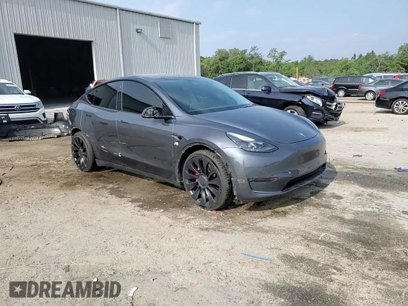 2022 Tesla Model Y Performance with VIN 7SAYGDEF4NF447462, listed as a Copart auction lot 58306595 with 61,671 mi miles and Non repairable. Bid and sale history available at DreamBid. Image 14.