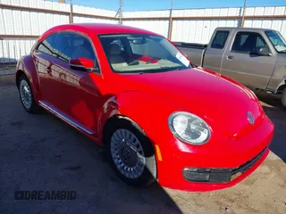 2013 Volkswagen Beetle with VIN 3VWHX7AT3DM682758, listed as a IAAI auction lot 40869170 with 88,793 mi miles and . Bid and sale history available at DreamBid. Image 1.