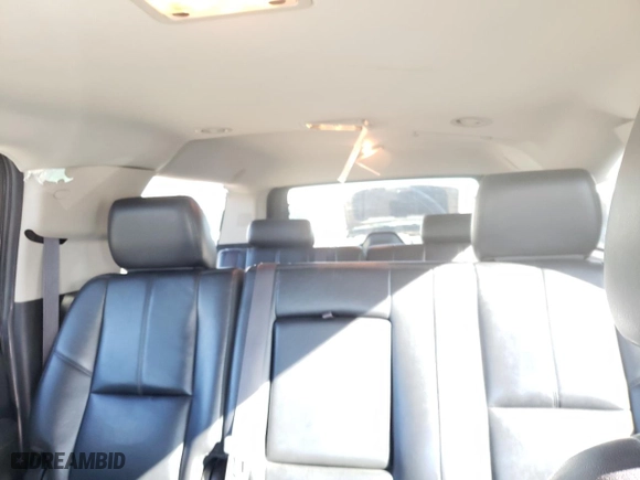 2014 Chevrolet Suburban LT with VIN 1GNSKJE73ER246291, listed as a Copart auction lot 74231304 with 140,688 mi miles and Salvage Title. Bid and sale history available at carsss.com. Image 20.
