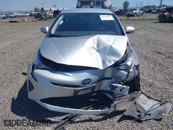 2017 Toyota Prius Two with VIN JTDKBRFU7H3574039, listed as a IAAI auction lot 42410071 with 101,080 mi miles and . Bid and sale history available at DreamBid. Image 12.