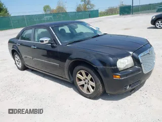 2006 Chrysler 300 Touring with VIN 2C3LA53G66H329729, listed as a IAAI auction lot 41946723 with 134,465 mi miles. Bid and sale history available at carsss.com. Image 1.