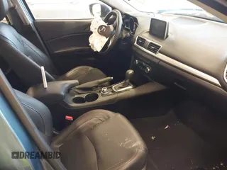 2014 Mazda 3 S Grand Touring with VIN JM1BM1W31E1182703, listed as a IAAI auction lot 41470742 with 123,956 mi miles and . Bid and sale history available at DreamBid. Image 5.