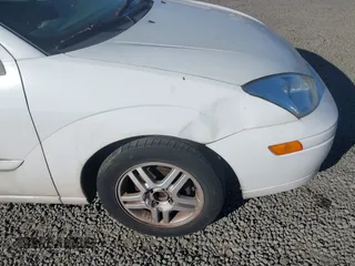 2001 Ford Focus SE with VIN 1FAFP34P21W279390, listed as a IAAI auction lot 42181178 with 123,580 mi miles and . Bid and sale history available at carsss.com. Image 6.