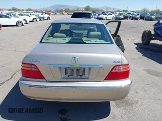 2000 Acura RL with VIN JH4KA9656YC001269, listed as a IAAI auction lot 41831469 with 158,504 mi miles. Bid and sale history available at carsss.com. Image 17.