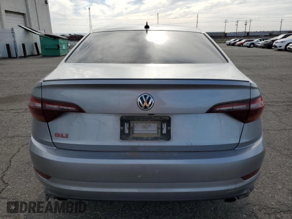 2019 Volkswagen Jetta GLI S z VIN 3VW6T7BU1KM244828, wystawiony jako Copart lot #56495205 z przebiegiem 112 512 mil mil oraz Szkoda całkowita • Salvage title. Historia ofert i sprzedaży dostępna na DreamBid. Obrazek 6.
