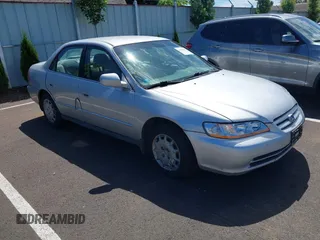 2002 Honda Accord LX z VIN 1HGCG56422A167829, wystawiony jako IAAI lot #42401497 z przebiegiem 221 550 mil mil oraz . Historia ofert i sprzedaży dostępna na DreamBid. Obrazek 1.