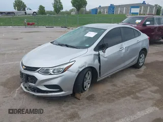 2018 Chevrolet Cruze LS with VIN 1G1BC5SM5J7126160, listed as a IAAI auction lot 42061395 with 145,098 mi miles and . Bid and sale history available at DreamBid. Image 2.