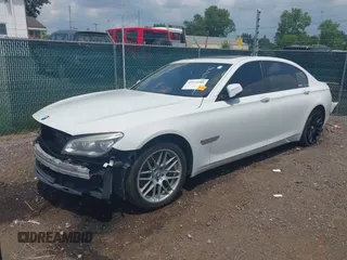 2015 BMW 7 Series 750Li xDrive with VIN WBAYF8C57FD655004, listed as a IAAI auction lot 42272205 with 77,677 mi miles and . Bid and sale history available at DreamBid. Image 2.