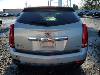 2014 Cadillac SRX Premium Collection z VIN 3GYFNGE34ES687663, wystawiony jako Copart lot #85854534 z przebiegiem 193 653 mil mil oraz Szkody całkowita. Historia ofert i sprzedaży dostępna na DreamBid. Obrazek 6.