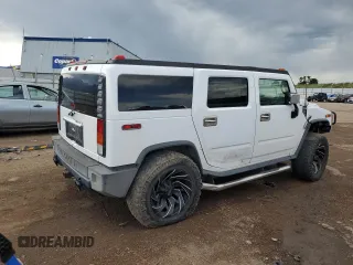 2004 Hummer H2 z VIN 5GRGN23U94H109105, wystawiony jako Copart lot #60548255 z przebiegiem 218 770 mil mil oraz Czysty tytuł • Clean title. Historia ofert i sprzedaży dostępna na DreamBid. Obrazek 3.
