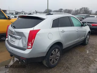2013 Cadillac SRX Luxury Collection with VIN 3GYFNGE32DS610269, listed as a IAAI auction lot 41607174 with 150,348 mi miles. Bid and sale history available at carsss.com. Image 4.
