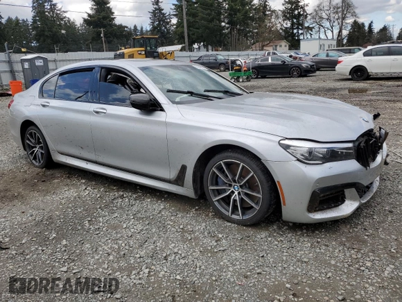 2018 BMW 7 Series 740i with VIN WBA7E2C53JG742711, listed as a Copart auction lot 51643505 with 0 mi miles and Salvage Title. Bid and sale history available at carsss.com. Image 4.