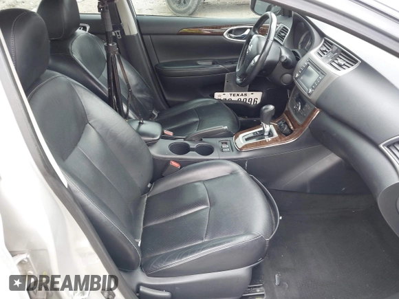 2014 Nissan Sentra S with VIN 3N1AB7AP4EY310204, listed as a IAAI auction lot 41621333 with 143,580 mi miles and . Bid and sale history available at DreamBid. Image 5.