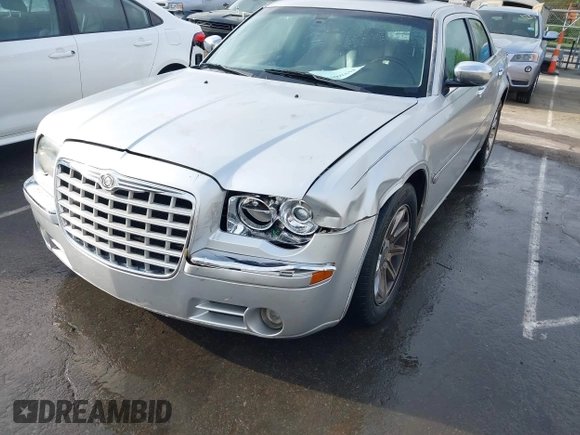 2006 Chrysler 300 C with VIN 2C3KA63H16H352507, listed as a IAAI auction lot 41926057 with 129,962 mi miles. Bid and sale history available at carsss.com. Image 6.