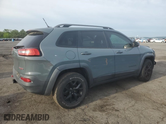 2014 Jeep Cherokee Trailhawk with VIN 1C4PJMBS3EW308706, listed as a Copart auction lot 58307975 with 90,530 mi miles and Salvage title. Bid and sale history available at DreamBid. Image 3.