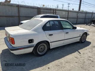 1995 BMW 5 Series 525i z VIN WBAHD6324SGK57242, wystawiony jako Copart lot #57287605 z przebiegiem Nie podano mil oraz Czysty tytuł • Clean title. Historia ofert i sprzedaży dostępna na DreamBid. Obrazek 3.