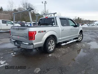 2015 Ford F-150 XLT with VIN 1FTEW1EF7FFA18623, listed as a IAAI auction lot 41629399 with 297,585 mi miles. Bid and sale history available at carsss.com. Image 4.
