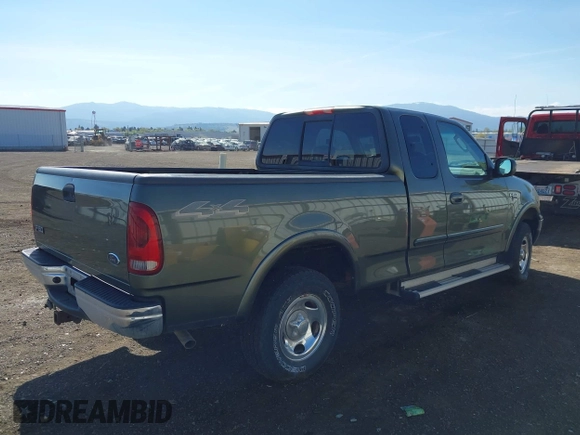 2002 Ford F-150 XL with VIN 2FTRX18W42CA61719, listed as a IAAI auction lot 42146516 with 99,774 mi miles and . Bid and sale history available at DreamBid. Image 4.
