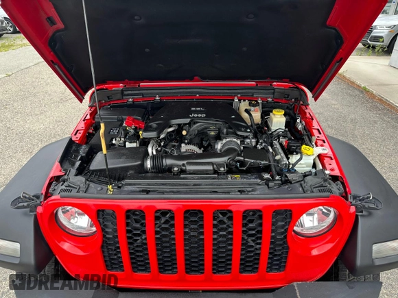 2020 Jeep Gladiator Sport S with VIN 1C6HJTAG7LL126346, listed as a Copart auction lot 64499175 with 147,236 mi miles and Clean title. Bid and sale history available at DreamBid. Image 7.