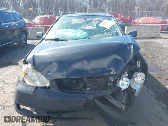 2004 Toyota Corolla CE with VIN 1NXBR32E34Z282167, listed as a IAAI auction lot 41832630 with 174,061 mi miles. Bid and sale history available at carsss.com. Image 12.