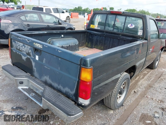 1994 Nissan Frontier z VIN 1N6SD11S2RC402971, wystawiony jako IAAI lot #42388139 z przebiegiem 122 571 mil mil oraz . Historia ofert i sprzedaży dostępna na DreamBid. Obrazek 4.