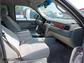 2007 Chevrolet Suburban LT with VIN 1GNFC16017R254537, listed as a IAAI auction lot 41875462 with 150,579 mi miles. Bid and sale history available at carsss.com. Image 5.