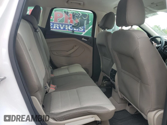 2014 Ford Escape SE z VIN 1FMCU9GX2EUC85787, wystawiony jako Copart lot #52739085 z przebiegiem 123 641 mil mil oraz Szkoda całkowita • Salvage title. Historia ofert i sprzedaży dostępna na DreamBid. Obrazek 11.