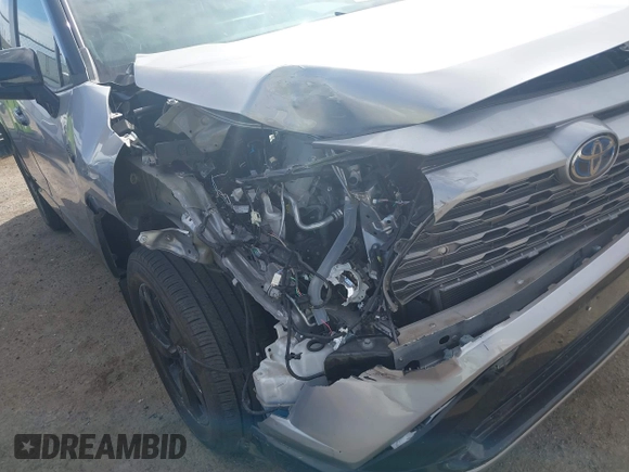 2021 Toyota RAV4 Hybrid XSE with VIN 4T3E6RFV6MU040399, listed as a IAAI auction lot 42020866 with 46,593 mi miles and . Bid and sale history available at DreamBid. Image 18.