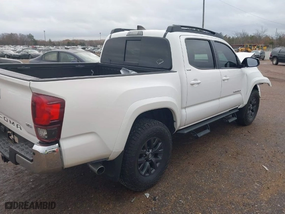 2020 Toyota Tacoma 2WD SR5 with VIN 5TFAZ5CN1LX094383, listed as a IAAI auction lot 41069987 with 85,733 mi miles. Bid and sale history available at carsss.com. Image 4.