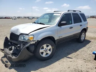 2007 Ford Escape Hybrid с VIN 1FMCU49H97KB36784, выставлен на аукционе Copart как лот 55136035 с пробегом Не указан миль и Списание • Salvage title. История ставок и продаж доступна на DreamBid. Изображение 1.