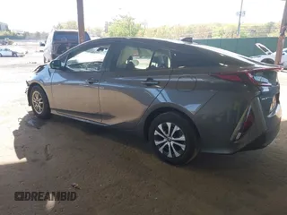 2021 Toyota Prius LE with VIN JTDKAMFP2M3168342, listed as a IAAI auction lot 42132946 with 69,628 mi miles and . Bid and sale history available at DreamBid. Image 3.