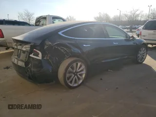 2019 Tesla Model 3 Mid Range with VIN 5YJ3E1EA9KF412525, listed as a Copart auction lot 48689825 with 134,768 mi miles and Salvage Title. Bid and sale history available at DreamBid. Image 3.