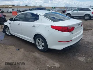 2015 Kia Optima LX with VIN KNAGM4A74F5653459, listed as a IAAI auction lot 42443188 with 109,129 mi miles and . Bid and sale history available at DreamBid. Image 3.