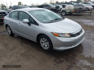 2012 Honda Civic Sdn LX with VIN 19XFB2F50CE353837, listed as a IAAI auction lot 41961162 with 140,583 mi miles. Bid and sale history available at carsss.com. Image 1.