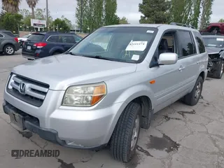 2006 Honda Pilot EX-L with VIN 2HKYF186X6H554433, listed as a IAAI auction lot 42111274 with 212,610 mi miles and . Bid and sale history available at carsss.com. Image 6.