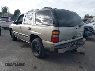 2001 Chevrolet Tahoe LS z VIN 1GNEC13T71R199027, wystawiony jako IAAI lot #41546283 z przebiegiem 232 905 mil mil oraz . Historia ofert i sprzedaży dostępna na DreamBid. Obrazek 3.