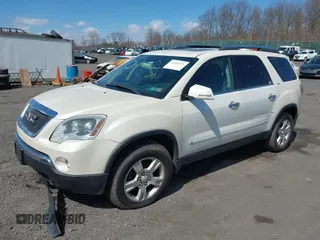 2009 GMC Acadia SLT2 with VIN 1GKEV33D89J154006, listed as a IAAI auction lot 41889276 with 202,516 mi miles. Bid and sale history available at carsss.com. Image 2.