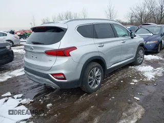 2019 Hyundai Santa Fe Ultimate with VIN 5NMS5CAD1KH000394, listed as a IAAI auction lot 41455421 with 42,886 mi miles and . Bid and sale history available at DreamBid. Image 4.