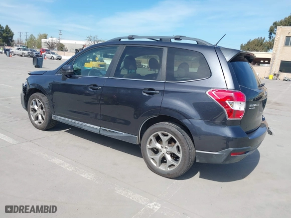 2015 Subaru Forester 2.5i Touring with VIN JF2SJAWC4FH523997, listed as a IAAI auction lot 41884674 with 175,127 mi miles. Bid and sale history available at carsss.com. Image 3.