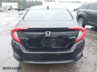 2017 Honda Civic Sedan Touring with VIN 2HGFC1F99HH658034, listed as a IAAI auction lot 41563627 with 140,819 mi miles. Bid and sale history available at carsss.com. Image 16.