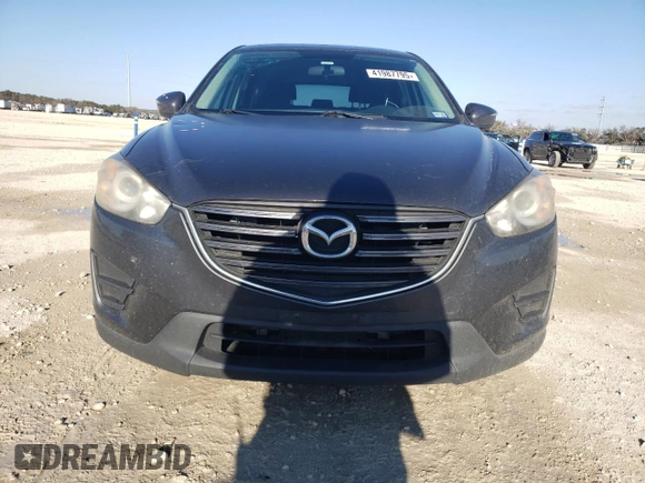 2016 Mazda CX-5 Sport with VIN JM3KE2BE9G0650543, listed as a Copart auction lot 41987795 with 163,528 mi miles and Salvage Title. Bid and sale history available at carsss.com. Image 5.